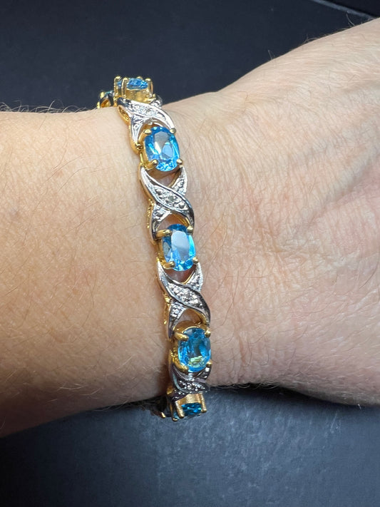 Vintage blue topaz and diamond gold over sterling silver tennis bracelet