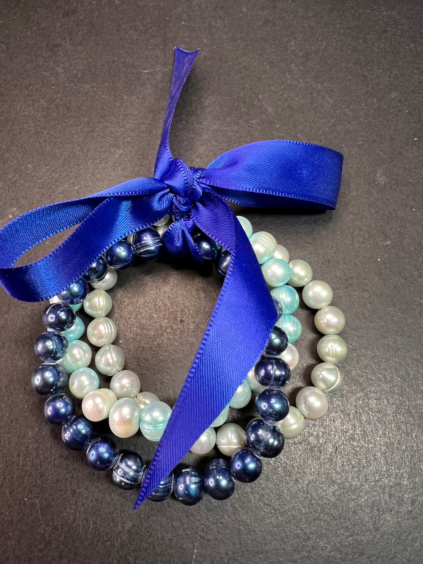 Set of three freshwater pearl shades of blue stretch bracelets