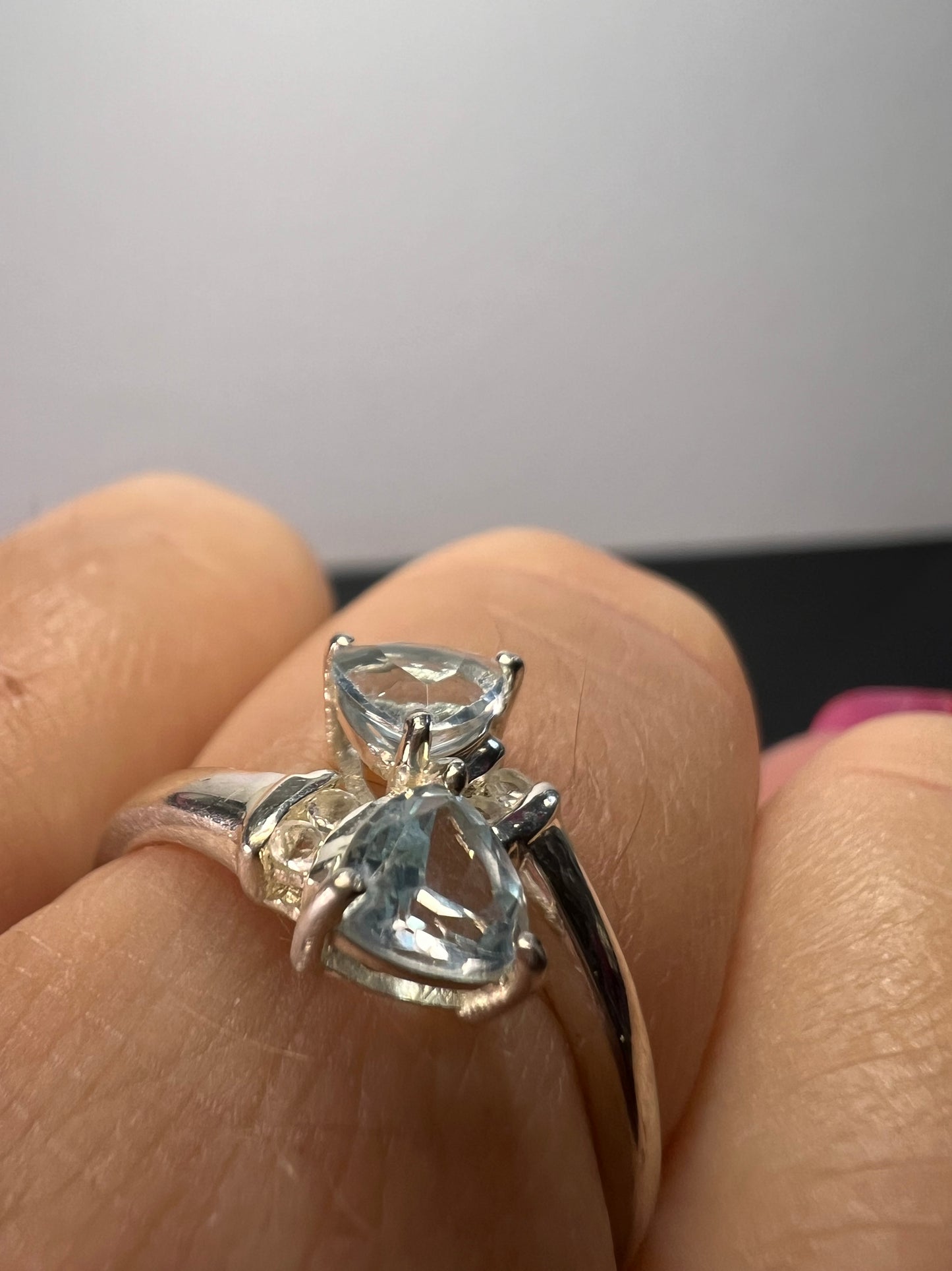 Trillium cut blue topaz bypass ring in rhodium over sterling silver size 9
