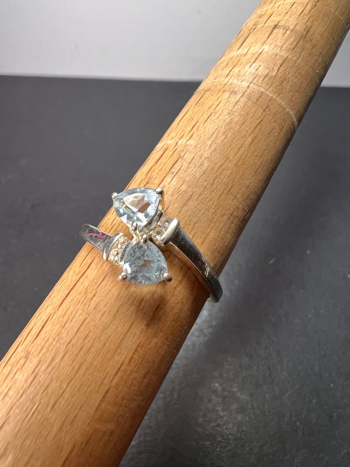 Trillium cut blue topaz bypass ring in rhodium over sterling silver size 9