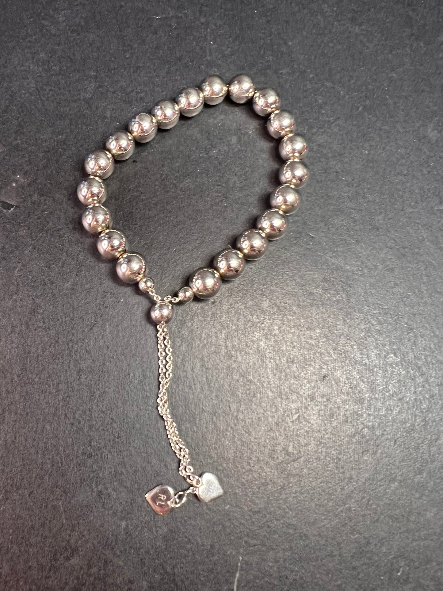 Ralph Lauren sterling silver bolo charm bracelet
