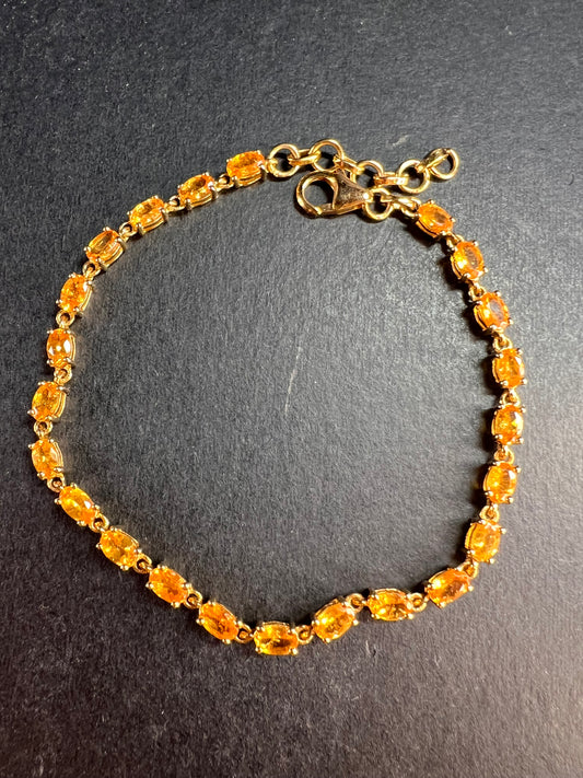 Yellow spessartine garnet tennis bracelet in gold over sterling silver