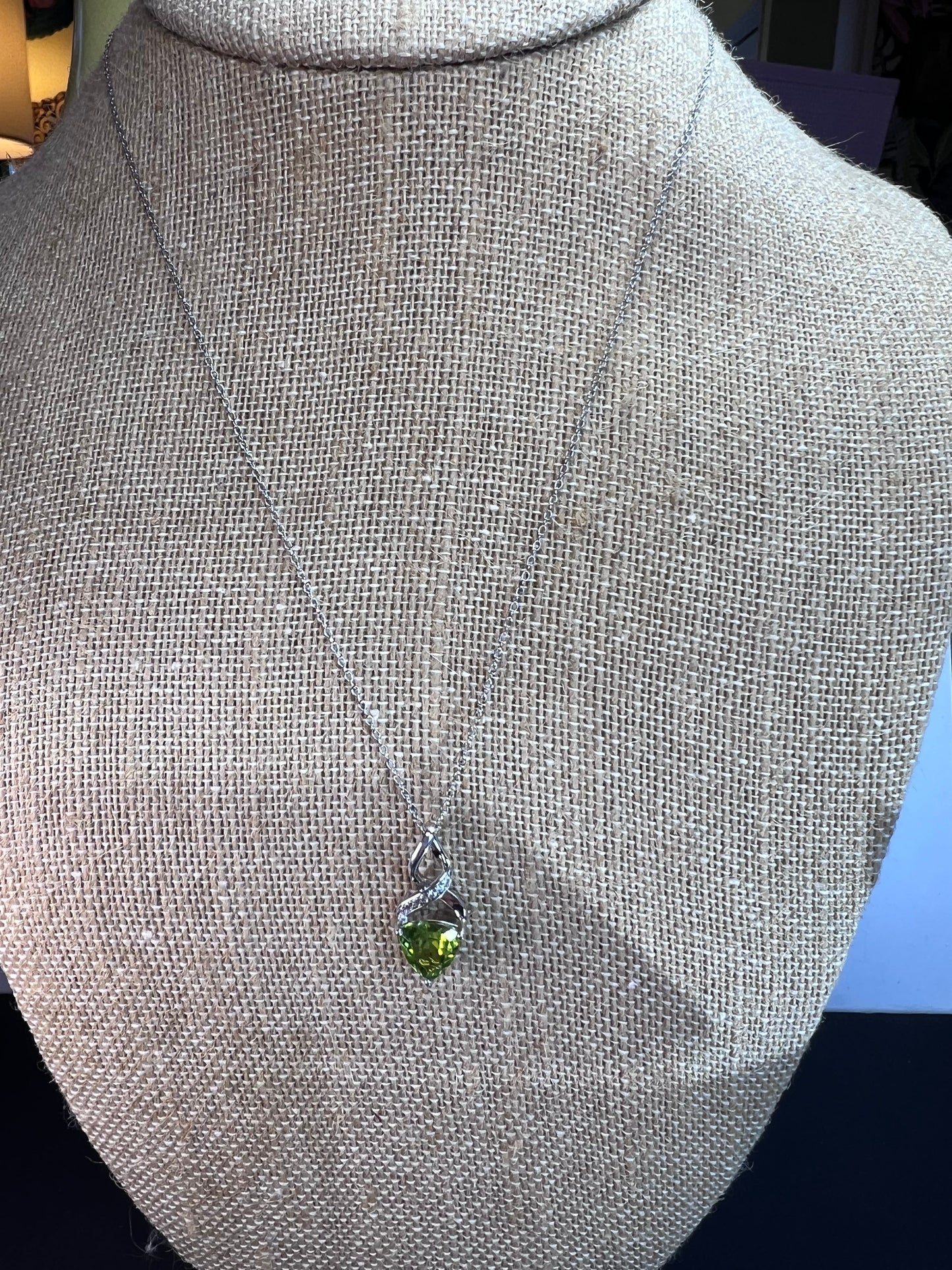 Trilliant cut peridot and sterling silver pendant and 18 inch chain