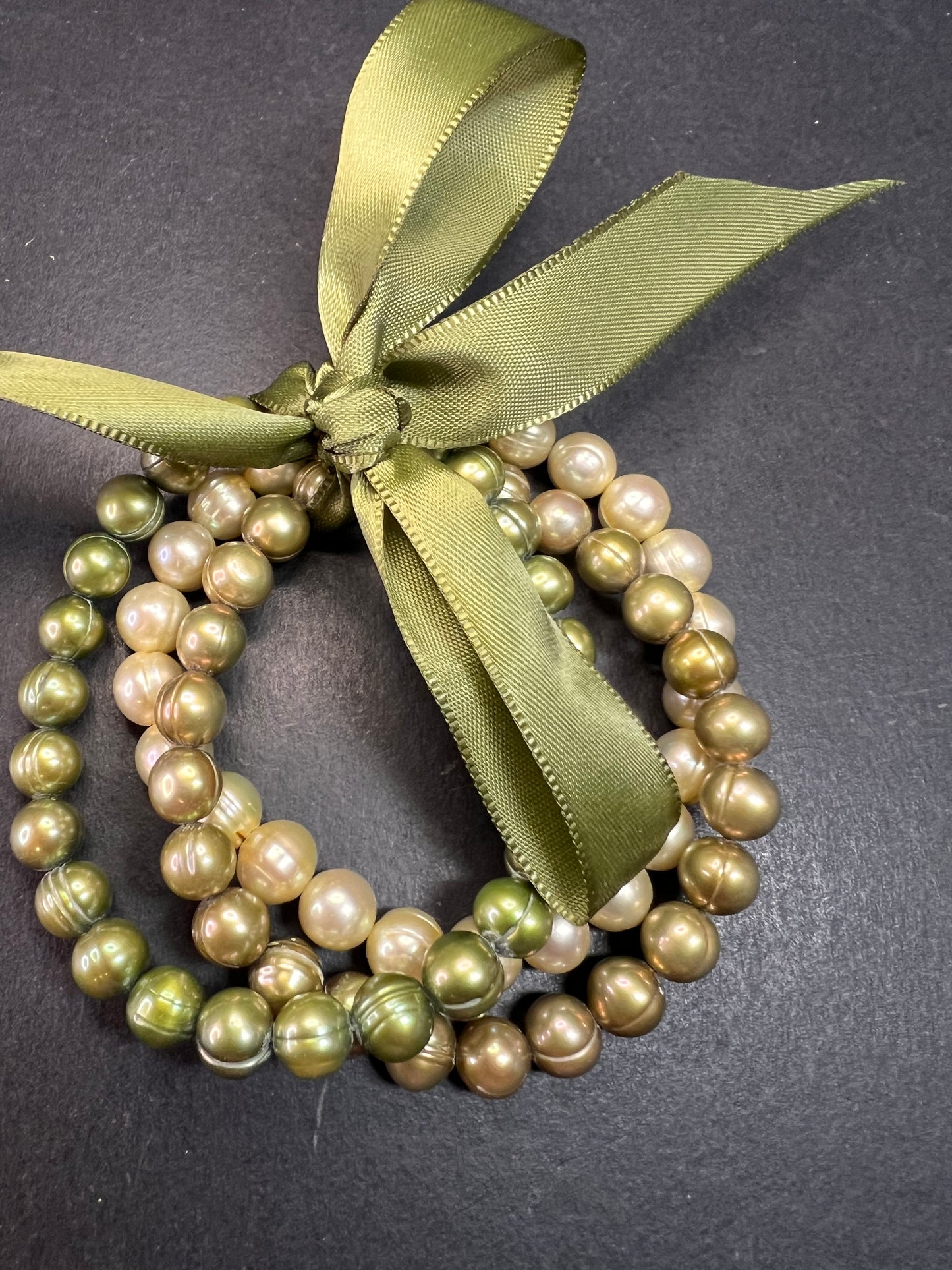 Set of three freshwater pearl shades of green stretch bracelets