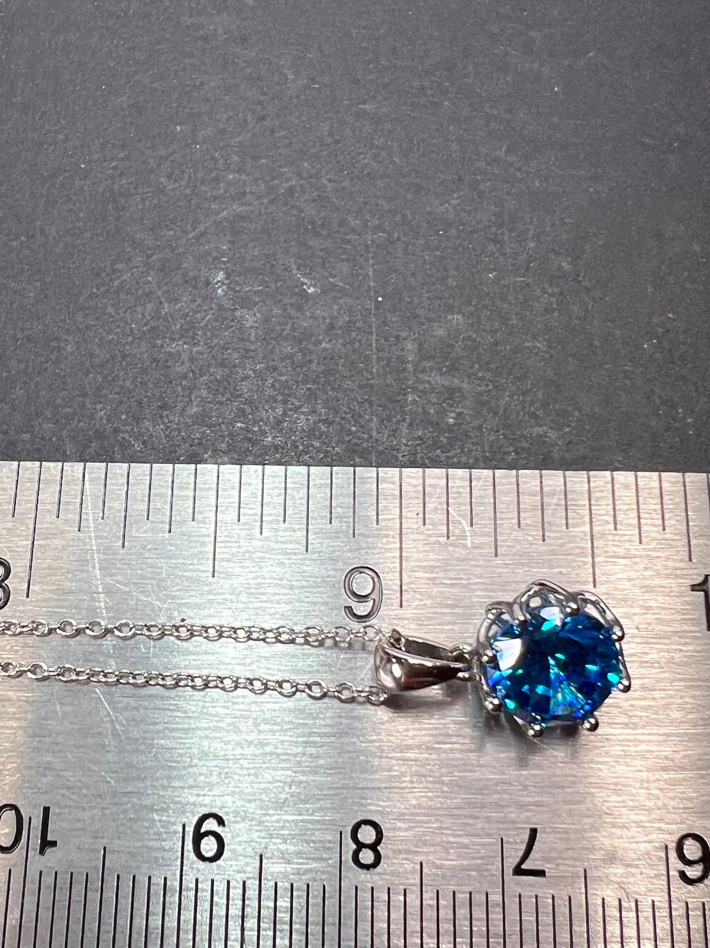 YGI blue CZ rhodium over sterling silver solitaire pendant and chain