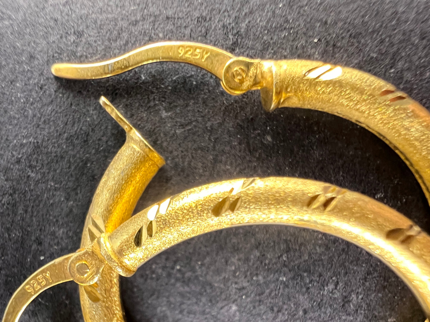 Satin finish diamond cut hoop earrings in yellow gold over sterling silver