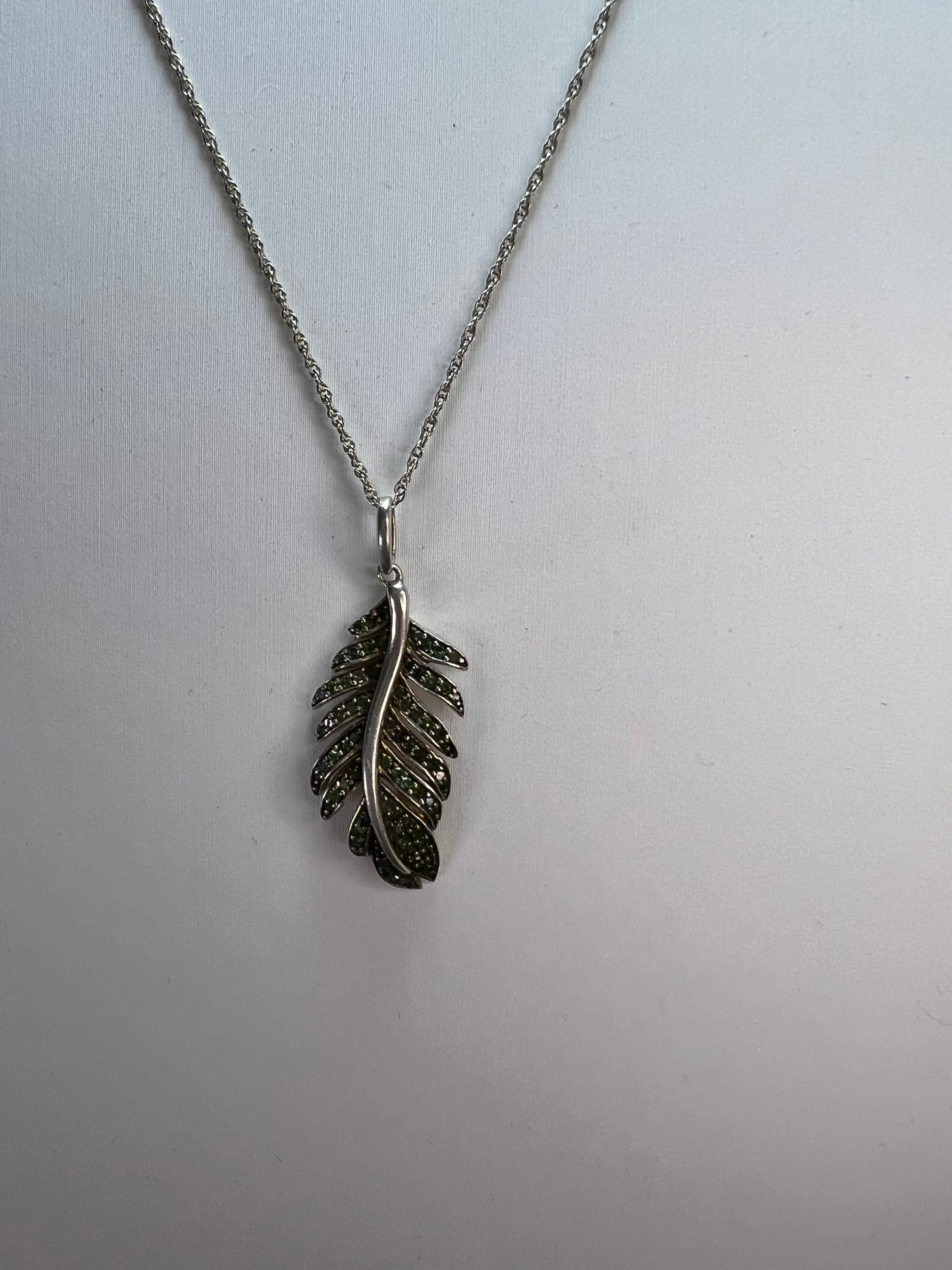 Natural green diamonds feather pendant and chain necklace in white gold over sterling silver