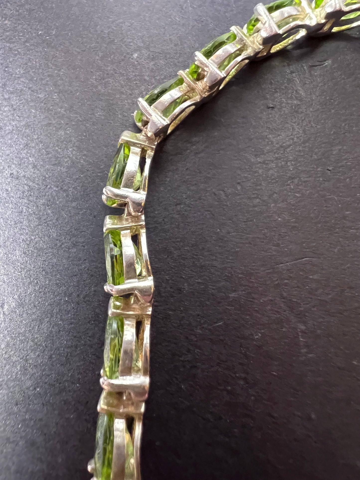 Peridot and sterling silver tennis bracelet