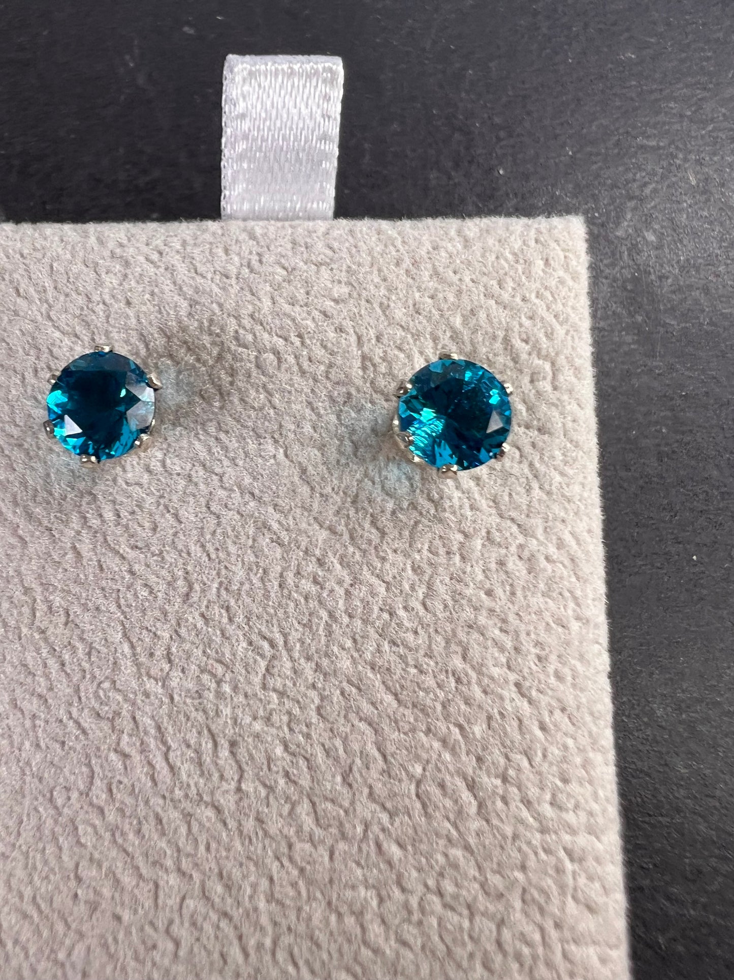 Blue stone stud earrings in sterling silver