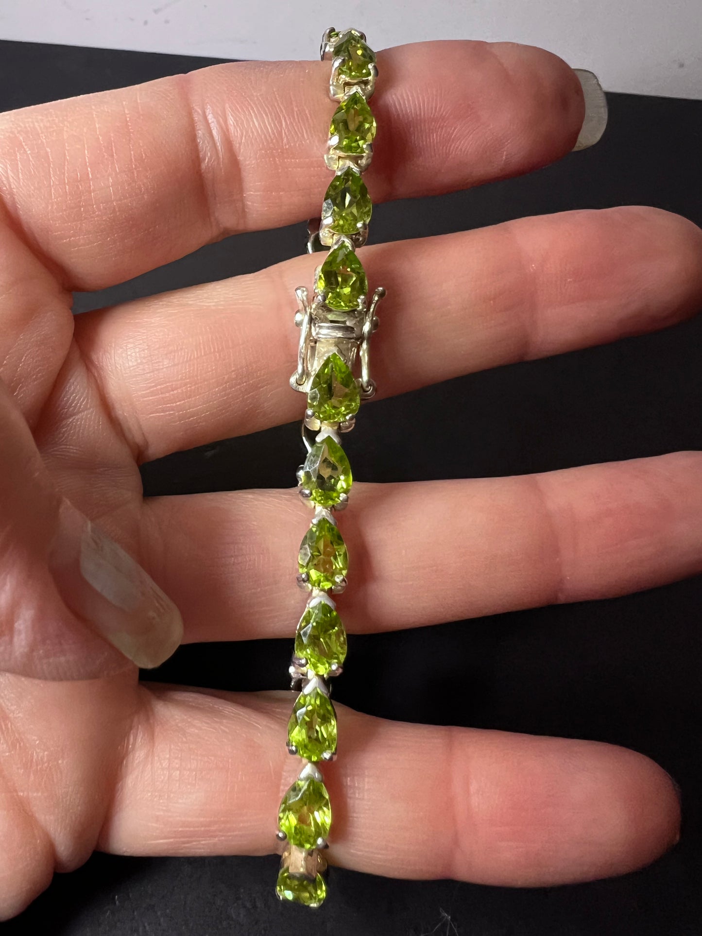 Peridot and sterling silver tennis bracelet