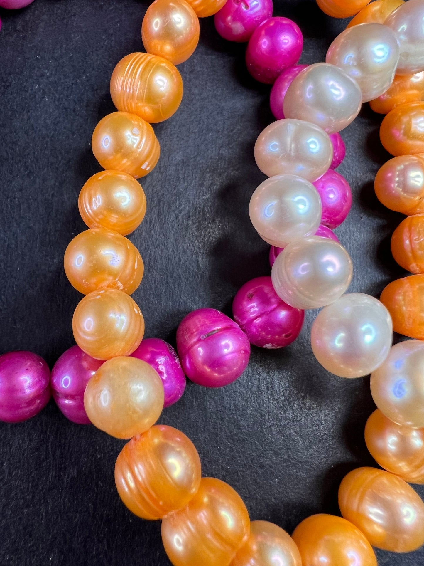 Set of three freshwater pearl stretch bracelets fuchsia pink to tangerine