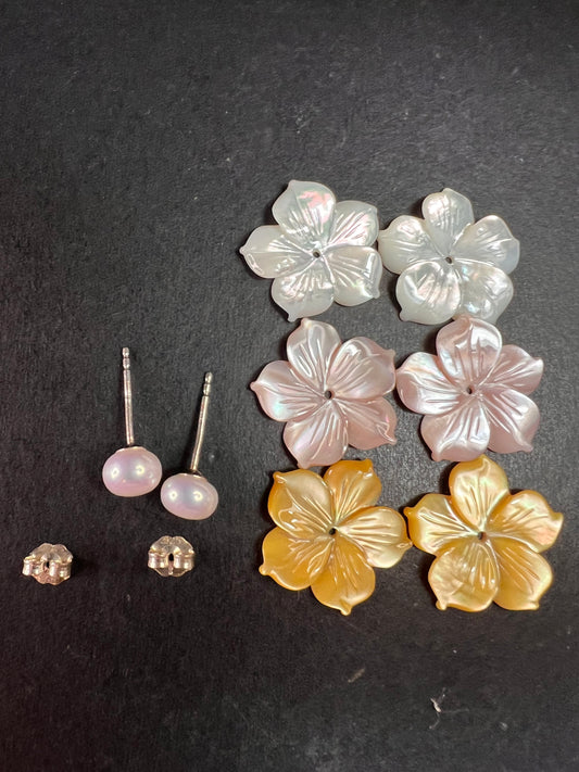 Vintage dead stock set of mother of pearl plumeria stud earrings in sterling silver