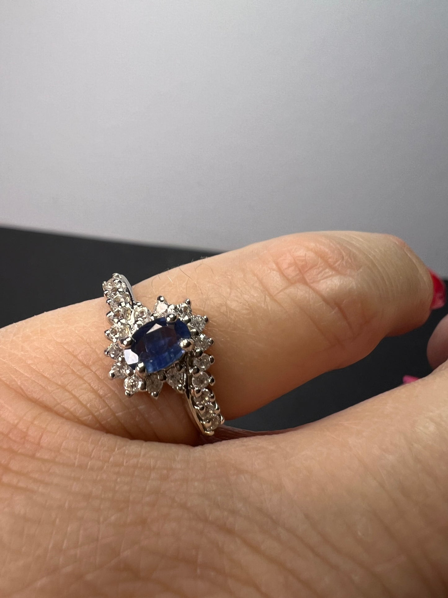 Blue sapphire and zircon floral ring in platinum over sterling silver size 5