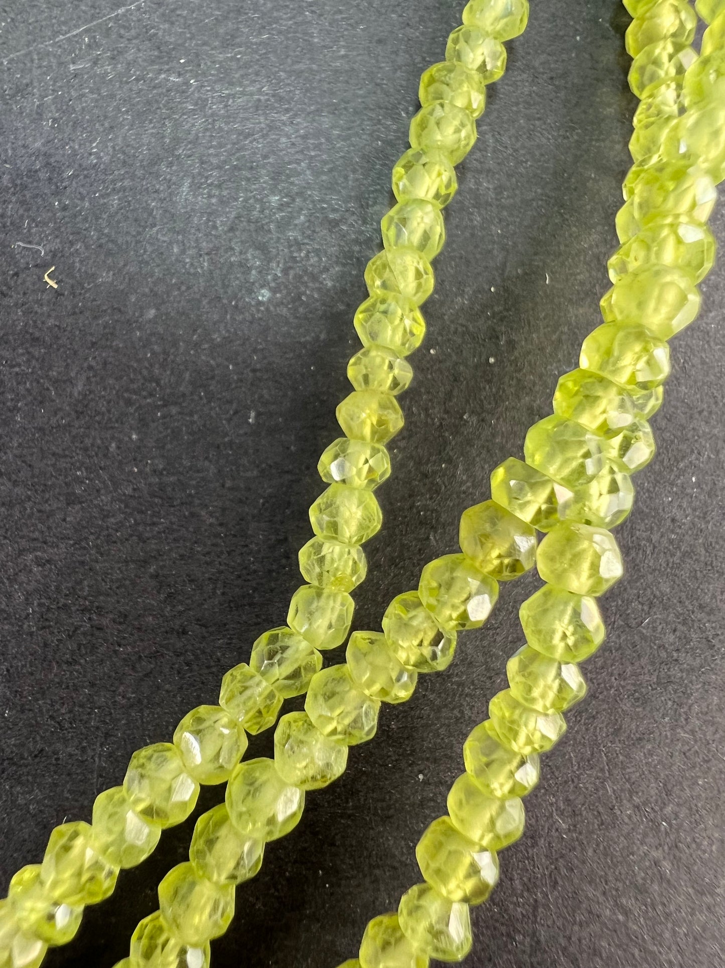 Layered peridot necklace with sterling silver clasp