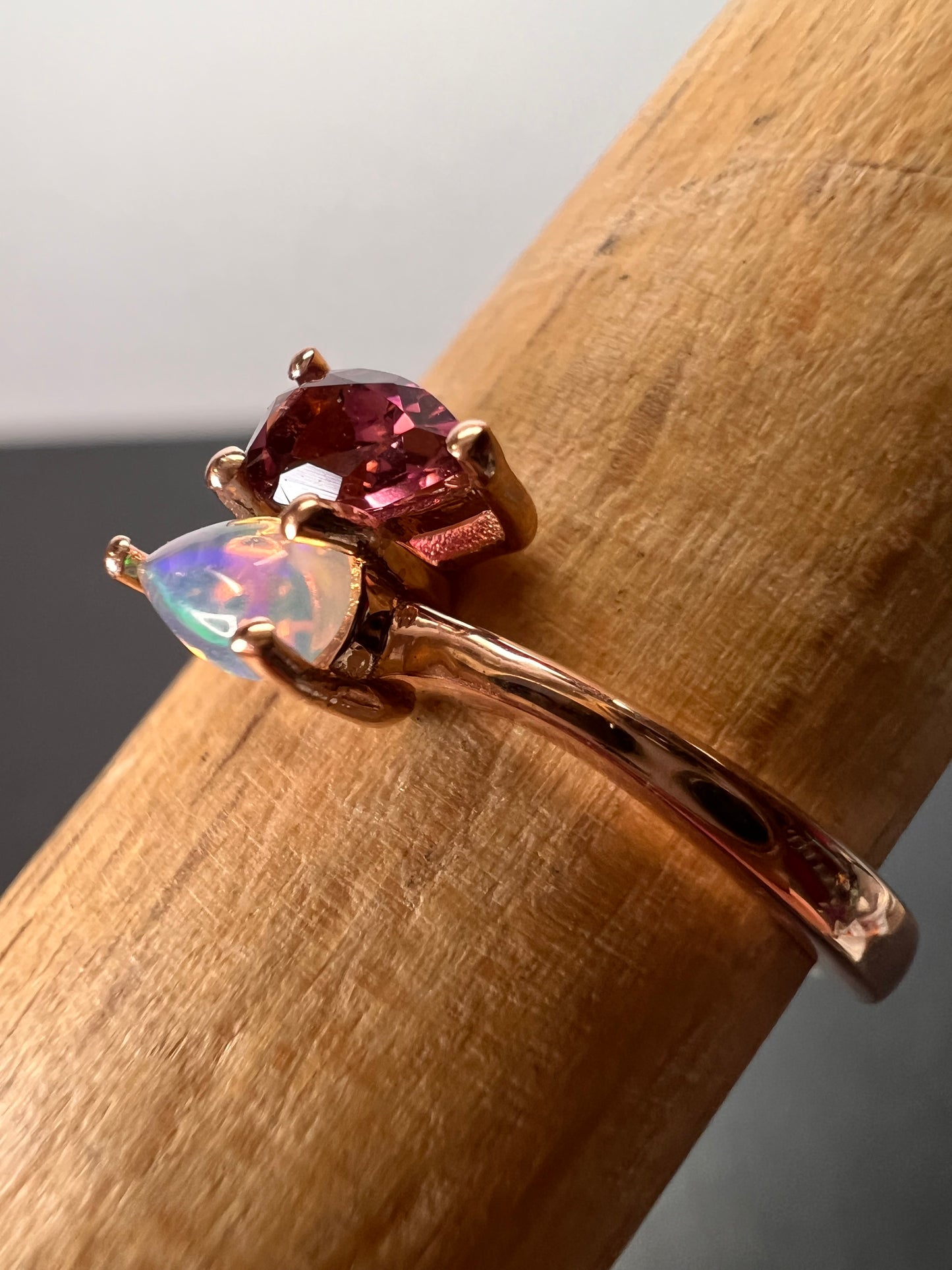 Rubellite and Ethiopian welo opal bypass ring in rose gold vermeil over sterling silver size 7. .35ctw