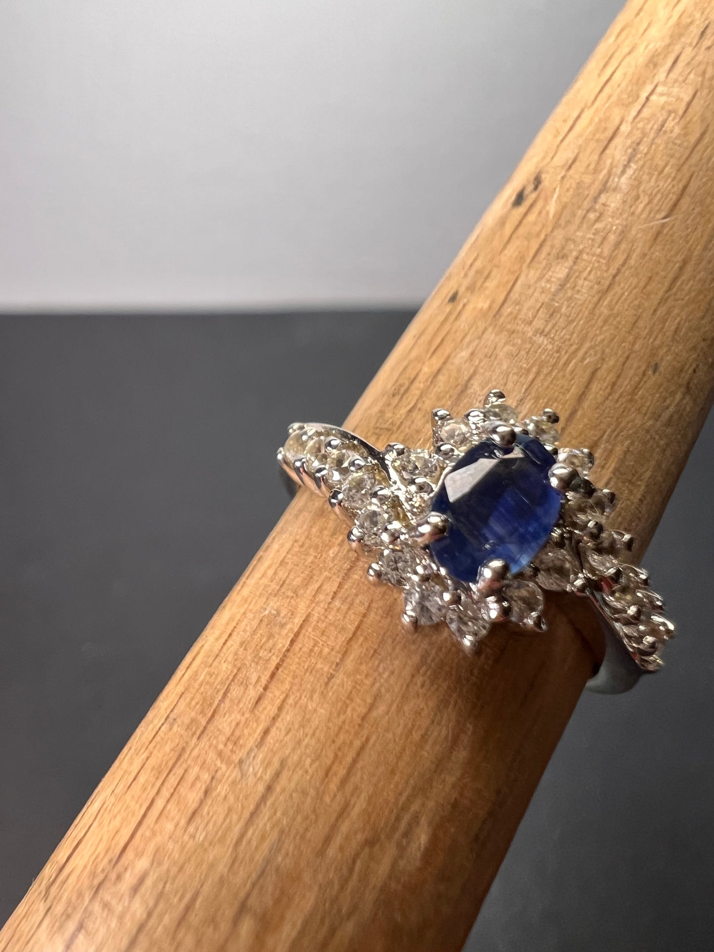 Blue sapphire and zircon floral ring in platinum over sterling silver size 5