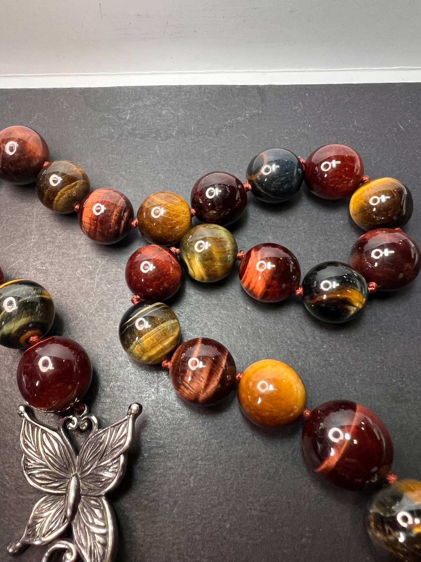 Multi tigers eye beaded knotted necklace with stainless steel toggle clasp