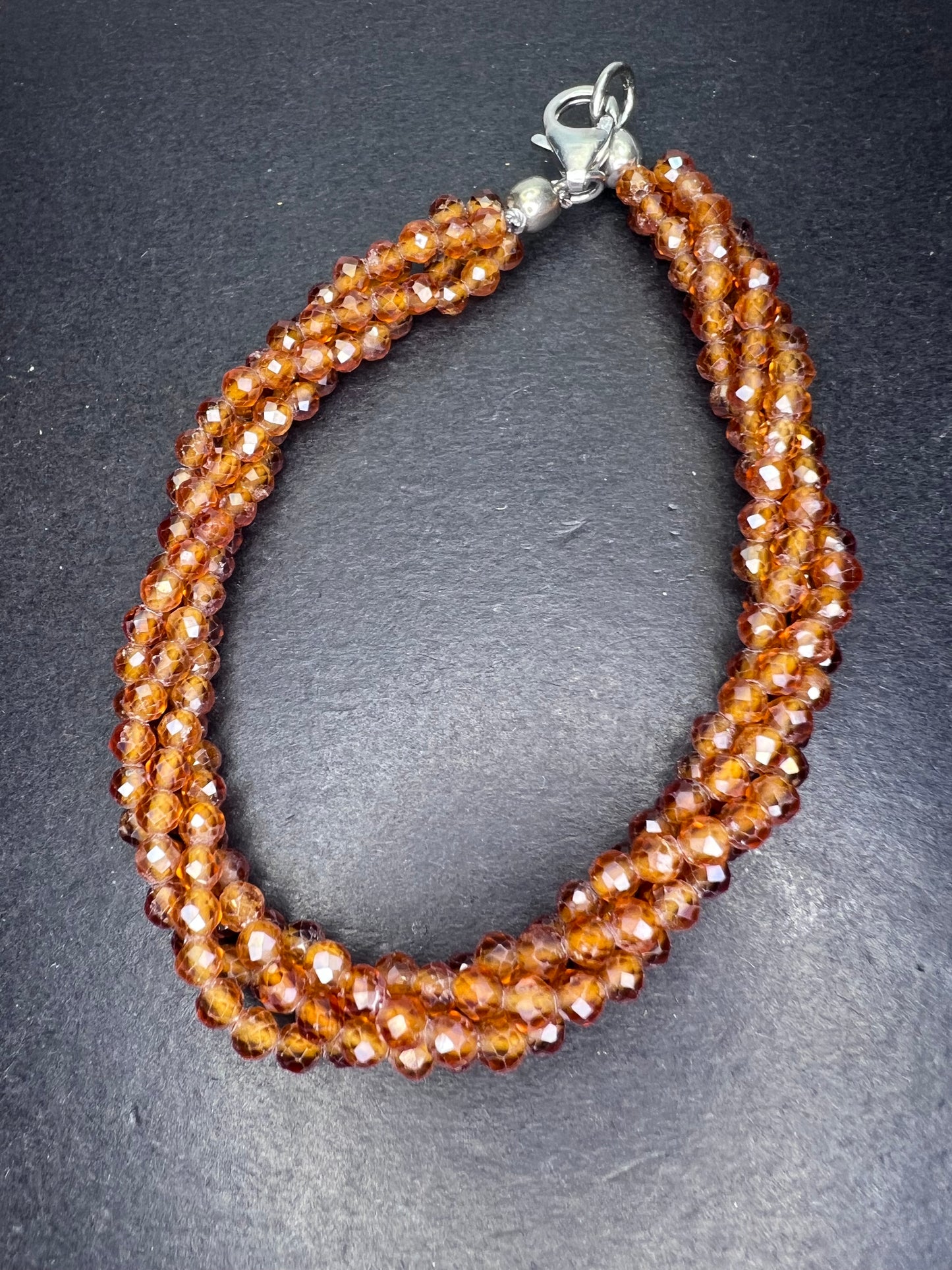 Hessonite garnet 4 strand bracelet with sterling clasp 7 inches