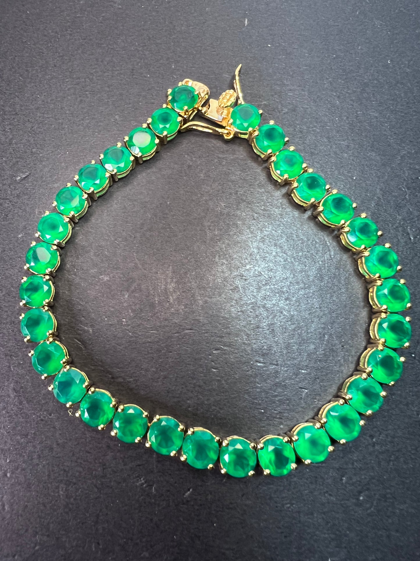 Green onyx tennis bracelet gold over sterling