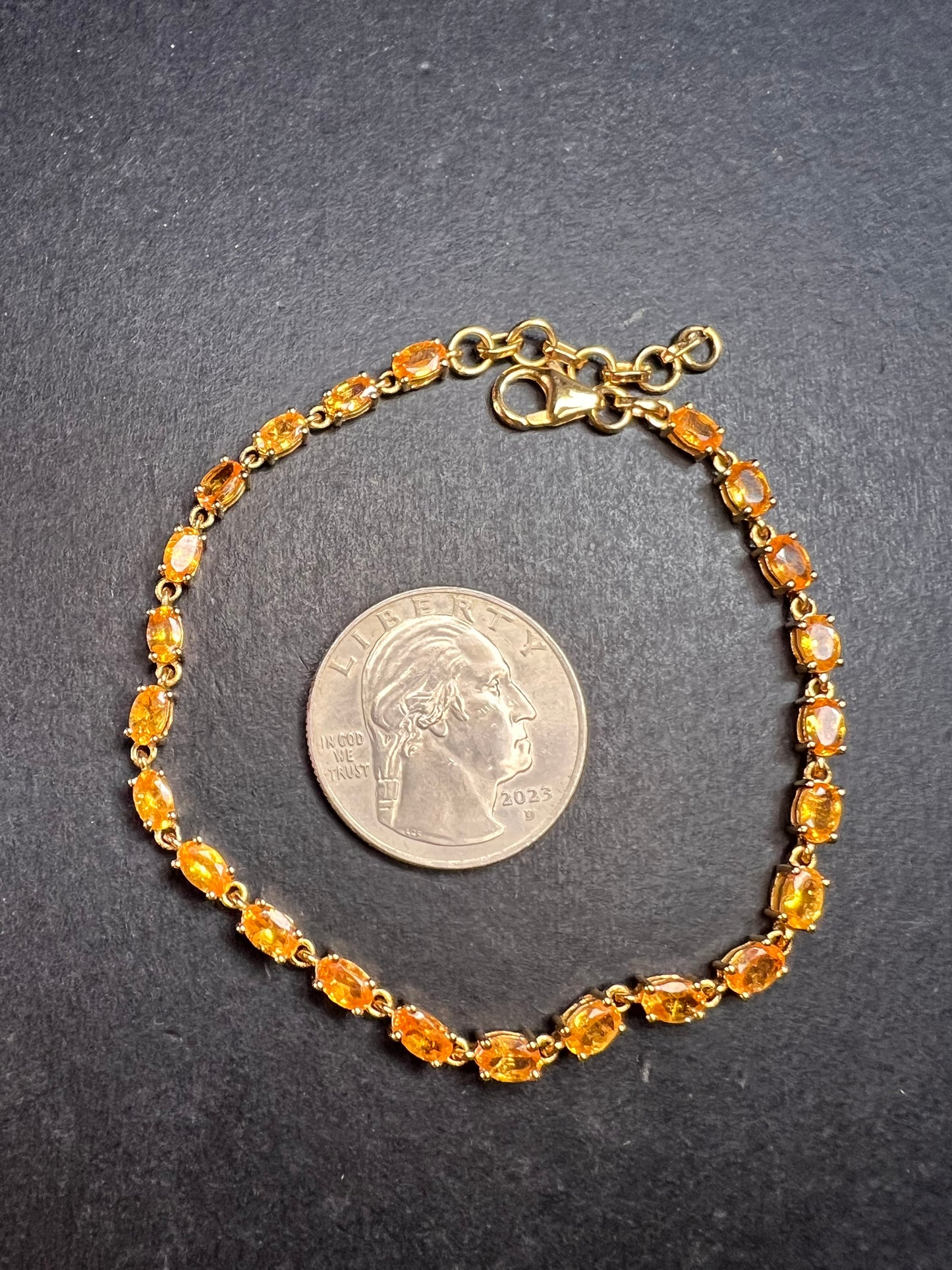 Yellow spessartine garnet tennis bracelet in gold over sterling silver