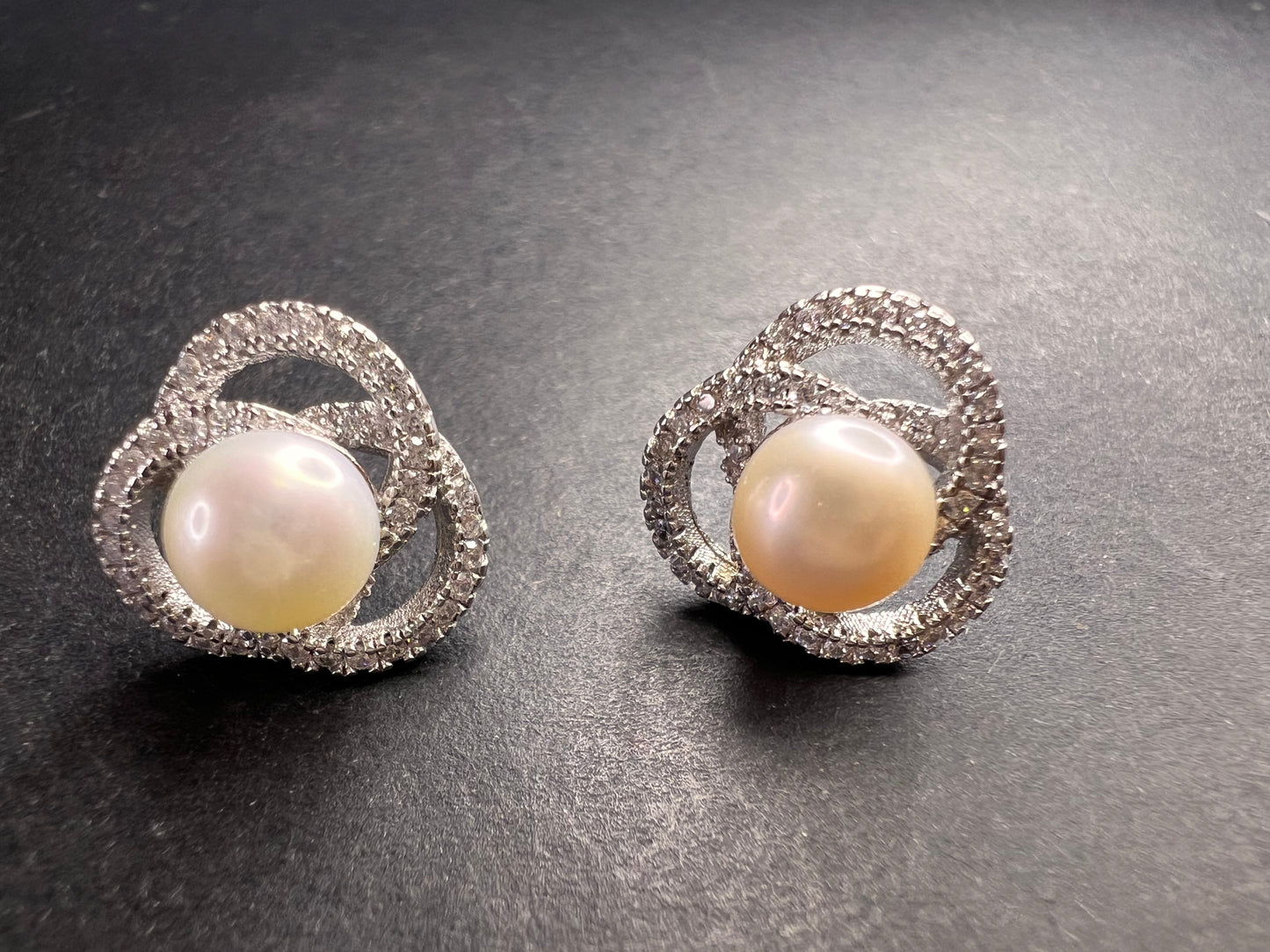 Cultured pearl swirl stud earrings in sterling silver with cz accents
