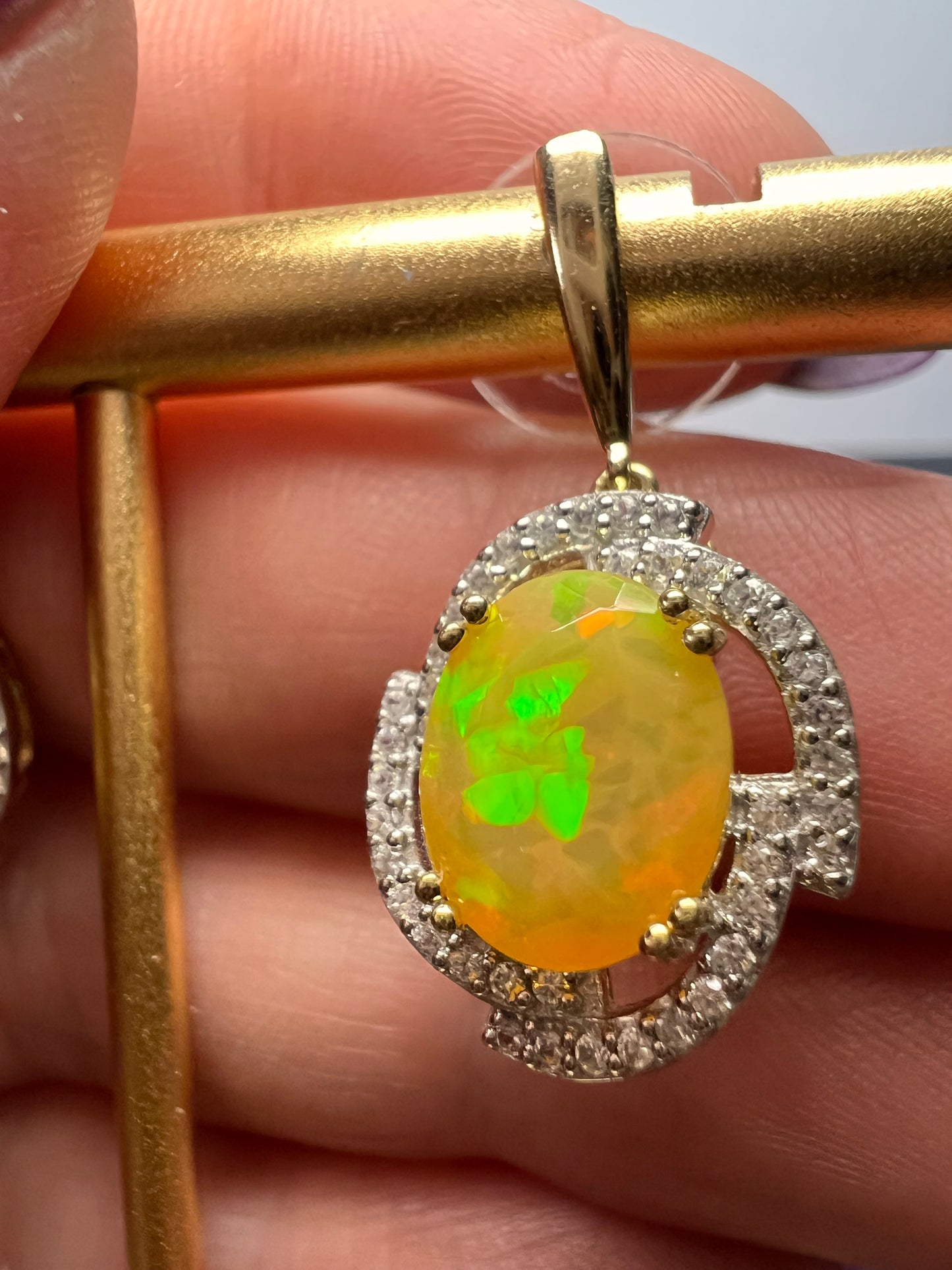 10k gold Ethiopian opal and white zircon earrings