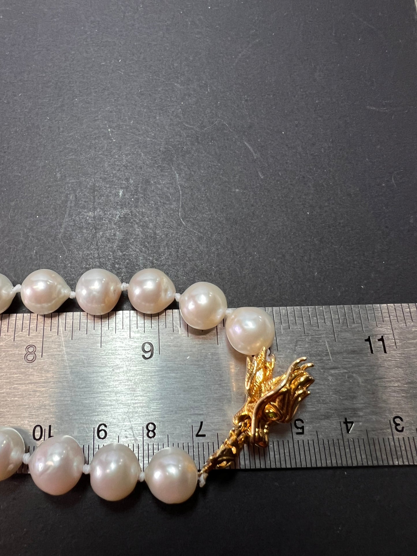 10-11mm white cultured pearl necklace with gold over sterling silver wolf head clasp 20 inch