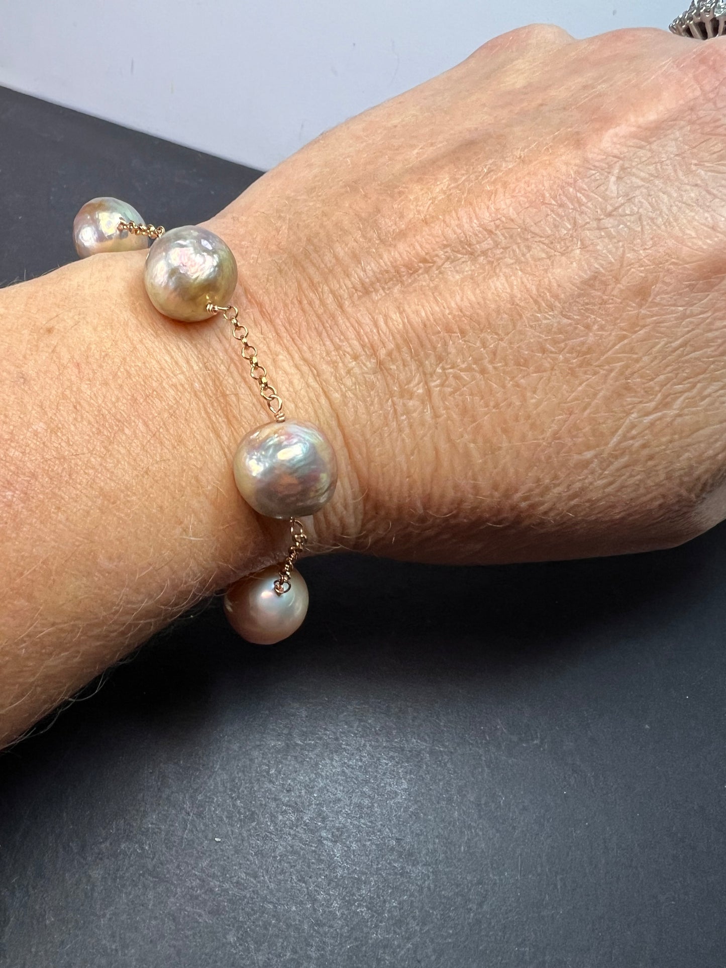 Multi colored baroque pearl station bracelet in rose gold over Sterling silver