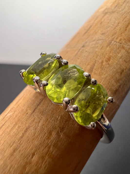 Peridot trilogy ring in platinum over Sterling silver size 7 *NEW*