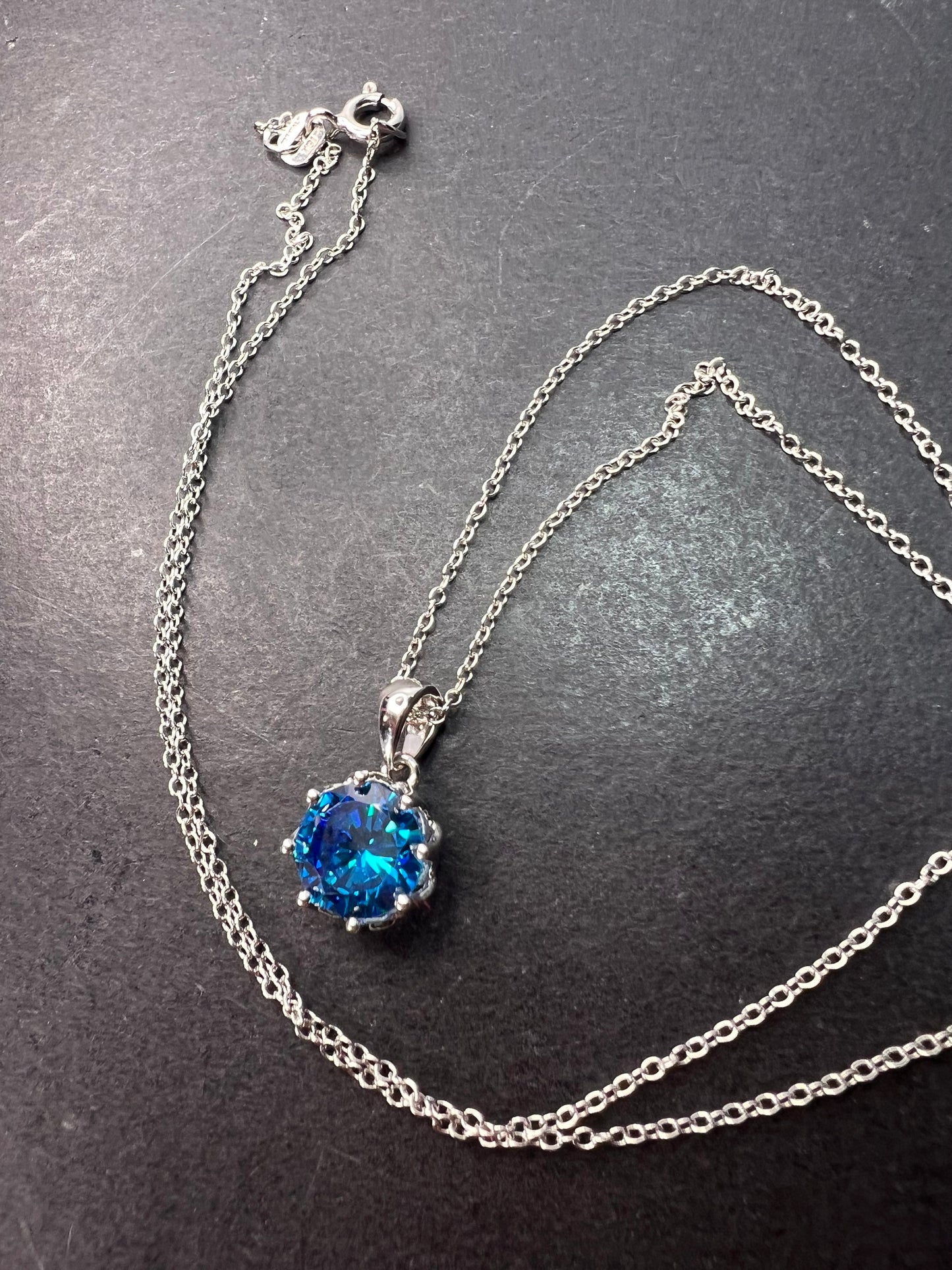 YGI blue CZ rhodium over sterling silver solitaire pendant and chain