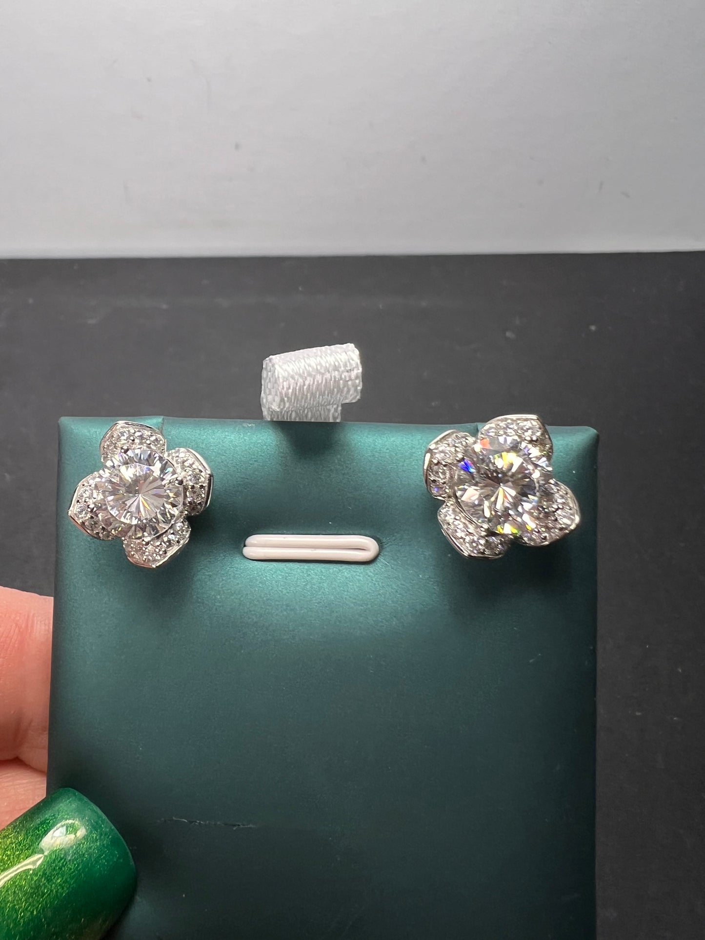 CZ floral styled stud earrings in rhodium over sterling silver