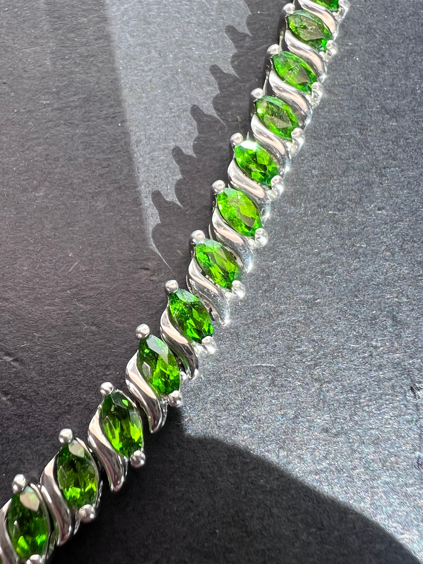 Chrome diopside tennis bracelet in rhodium over sterling silver