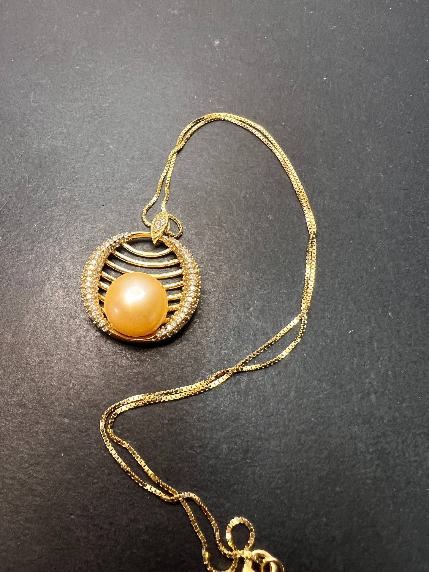 Golden yellow cultured pearl pendant in gold over sterling silver with chain