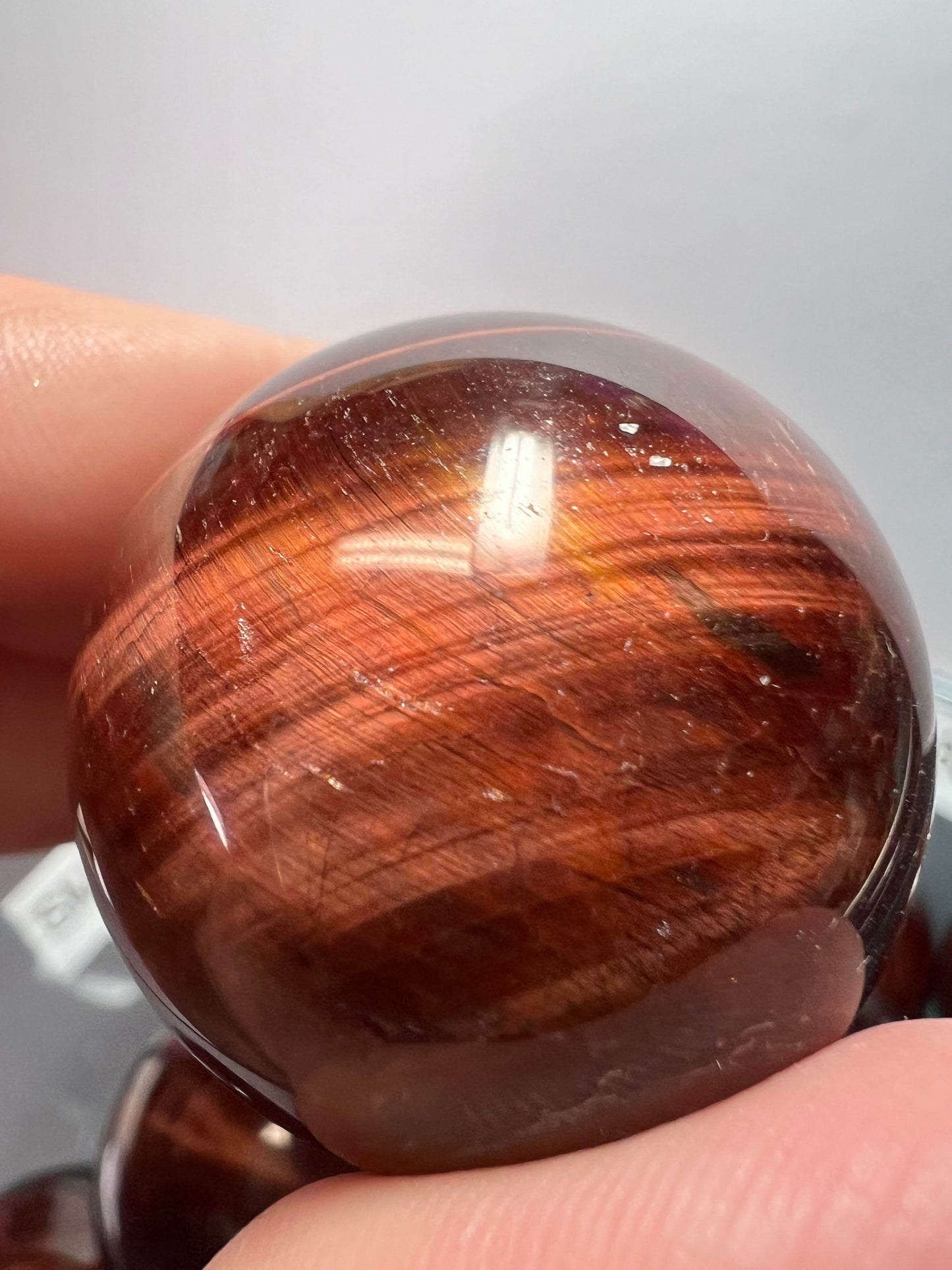 Red tigers eye sphere