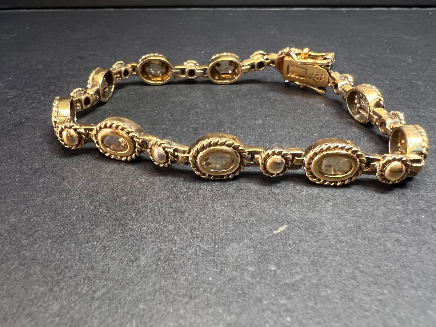 Vintage citrine tennis bracelet in yellow gold over sterling silver