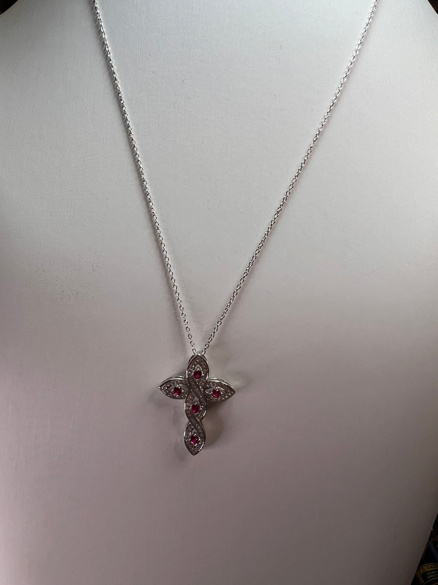 Lab grown ruby and CZ cross pendant and chain necklace in rhodium over sterling silver 18 inch