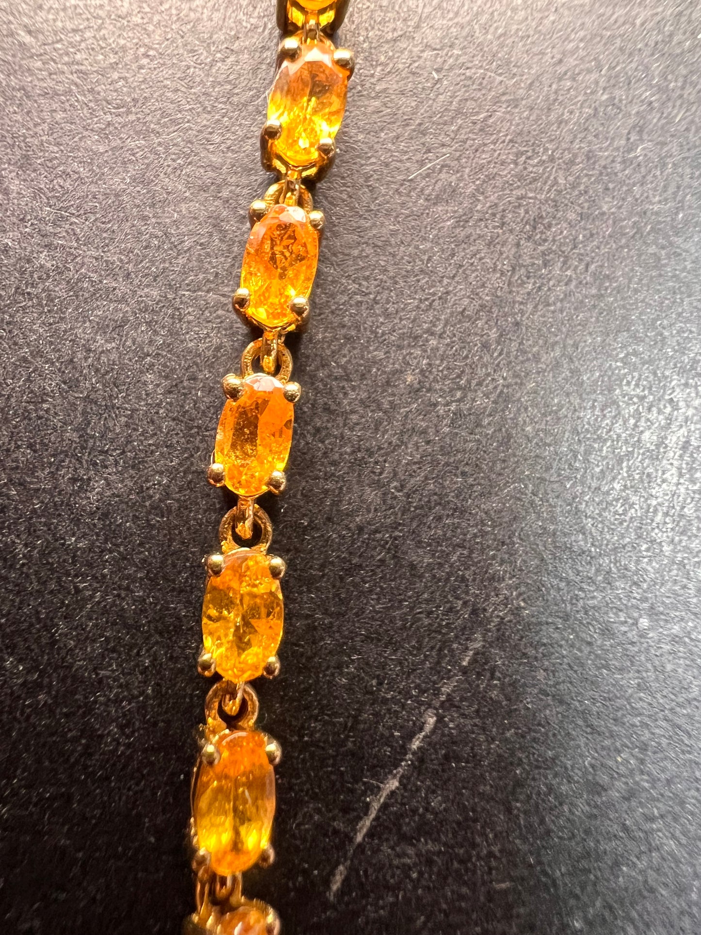 Yellow spessartine garnet tennis bracelet in gold over sterling silver