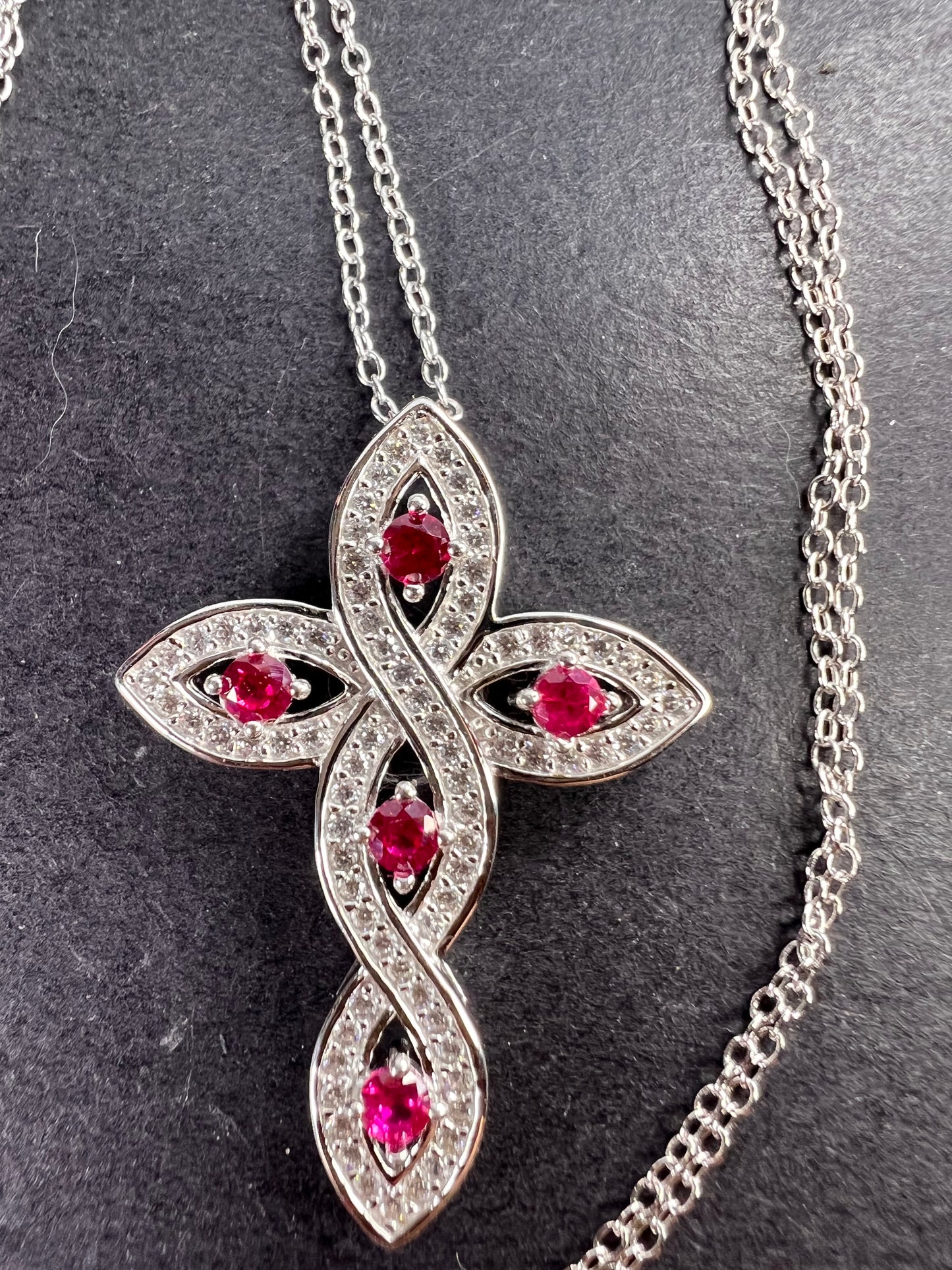 Lab grown ruby and CZ cross pendant and chain necklace in rhodium over sterling silver 18 inch