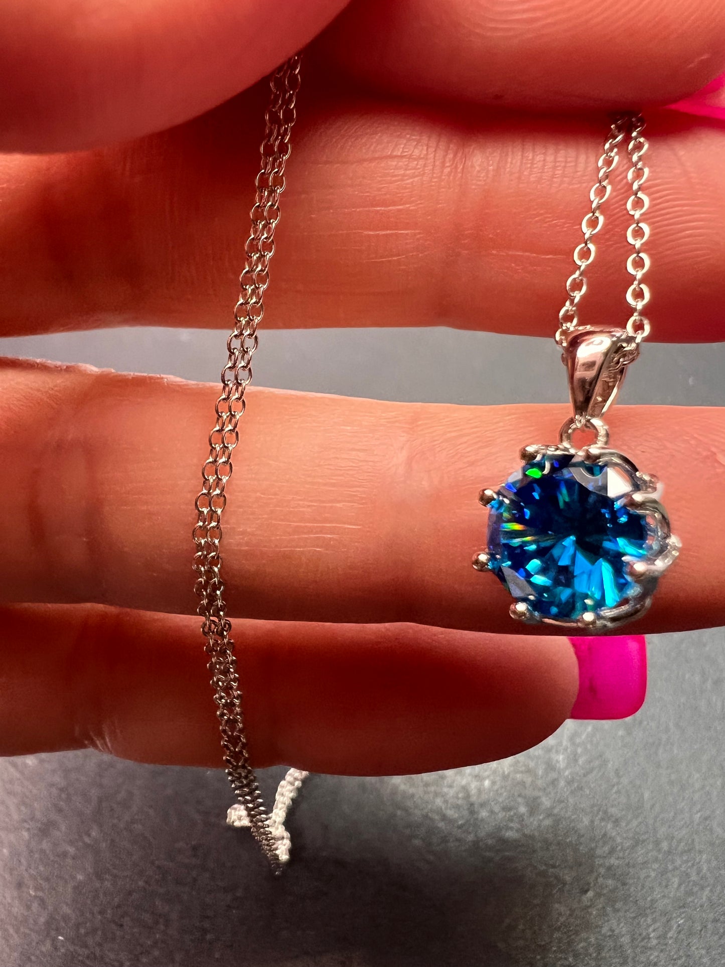 YGI blue CZ rhodium over sterling silver solitaire pendant and chain