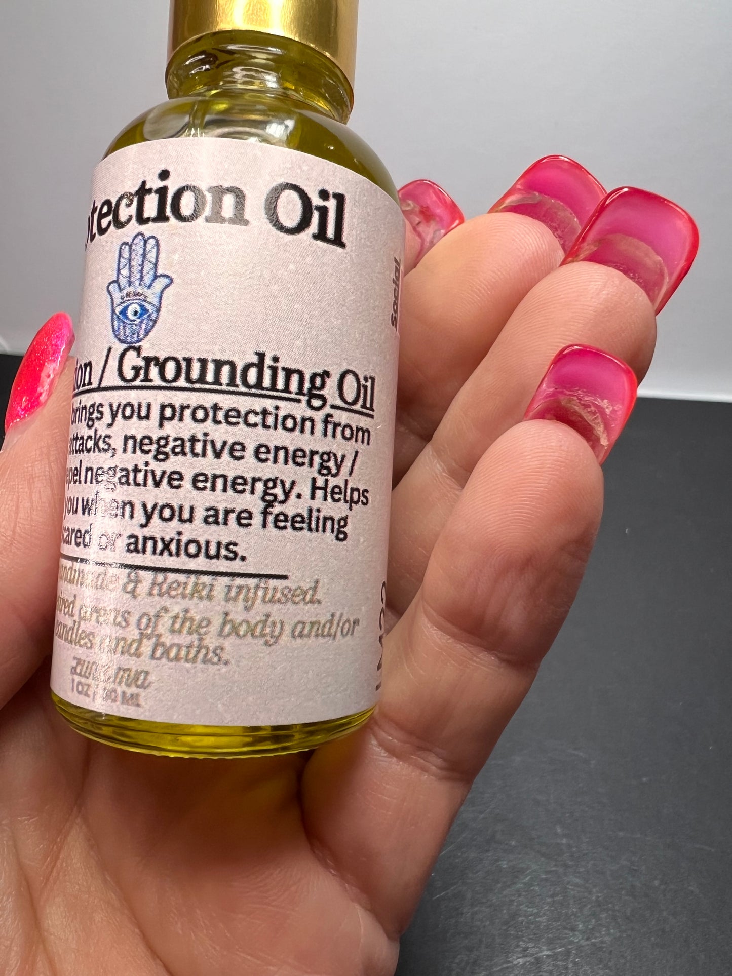 Protection and grounding oil by Luna Mia