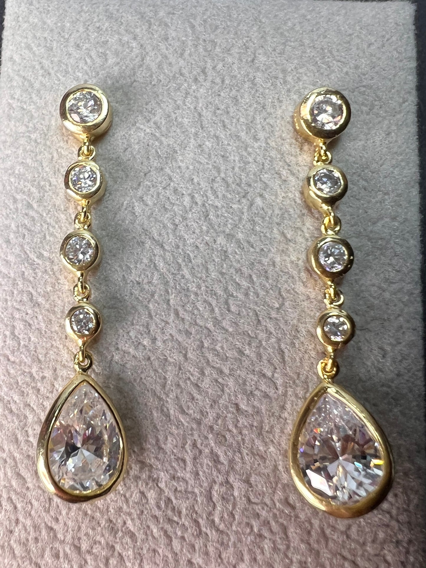 Long teardrop CZ earrings in gold over sterling silver