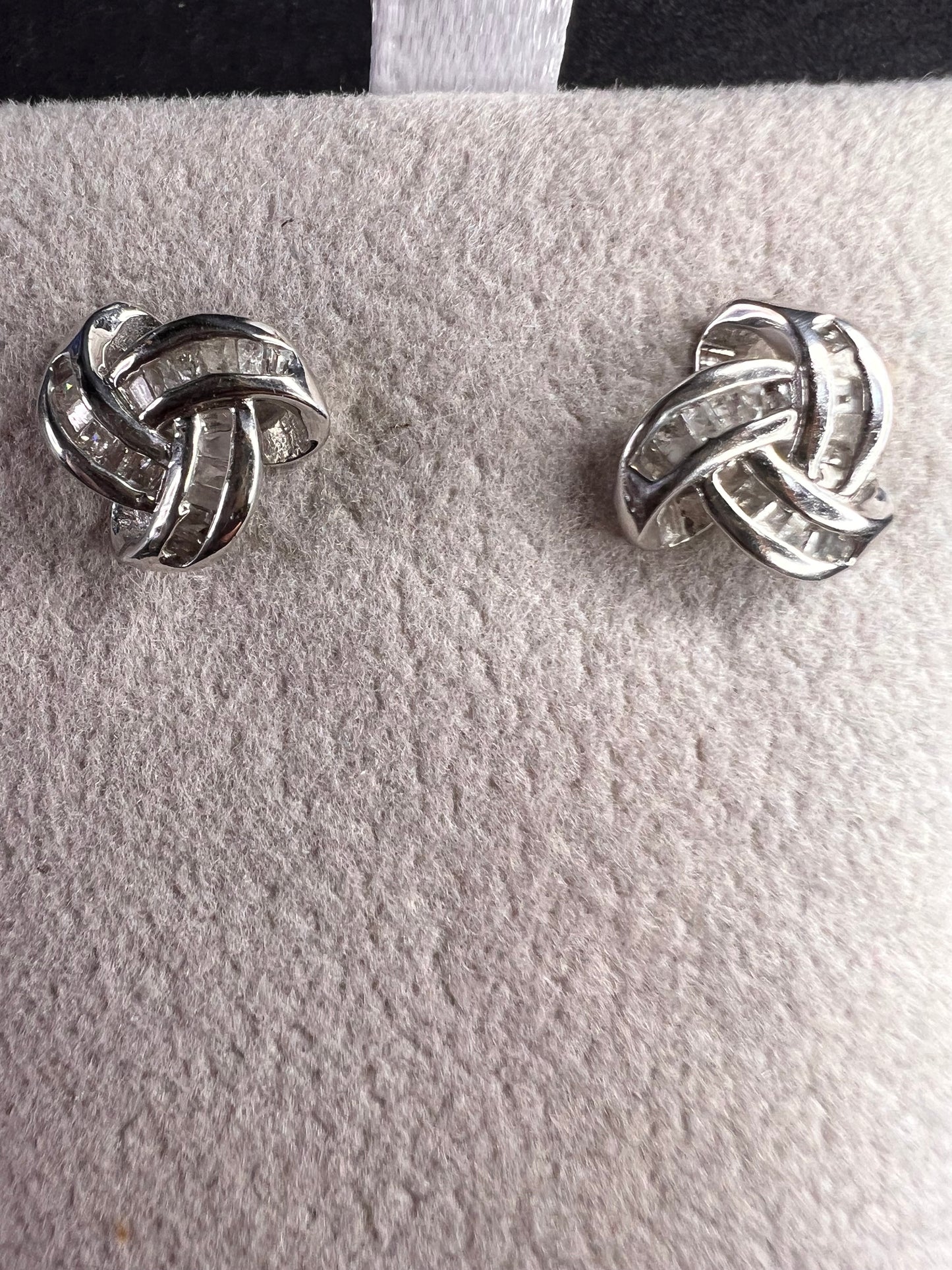 Diamond Celtic knot earrings in platinum over sterling silver .25ctw