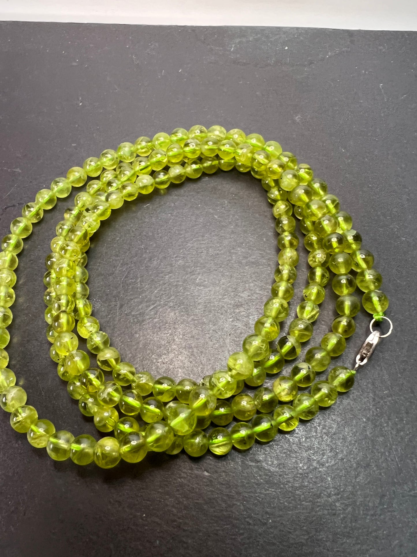 6mm high grade peridot beaded 36 inch necklace with sterling silver clasp