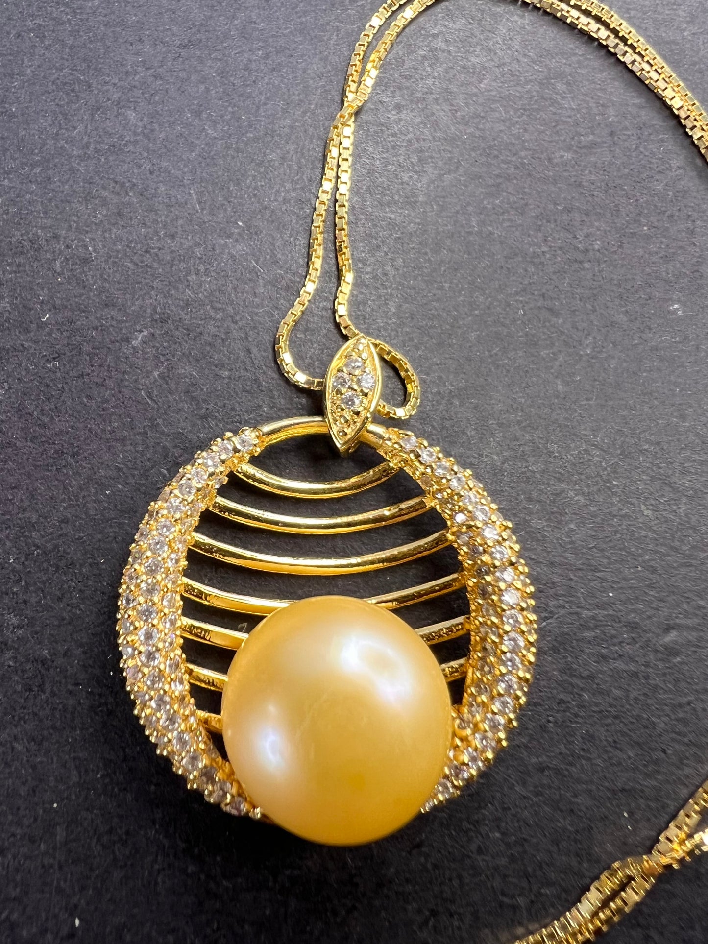 Golden yellow cultured pearl pendant in gold over sterling silver with chain