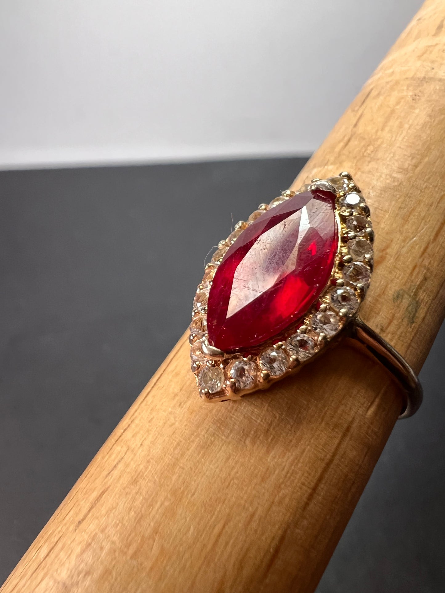 Marquis Ruby and white zircon halo ring in rose gold over sterling silver size 9