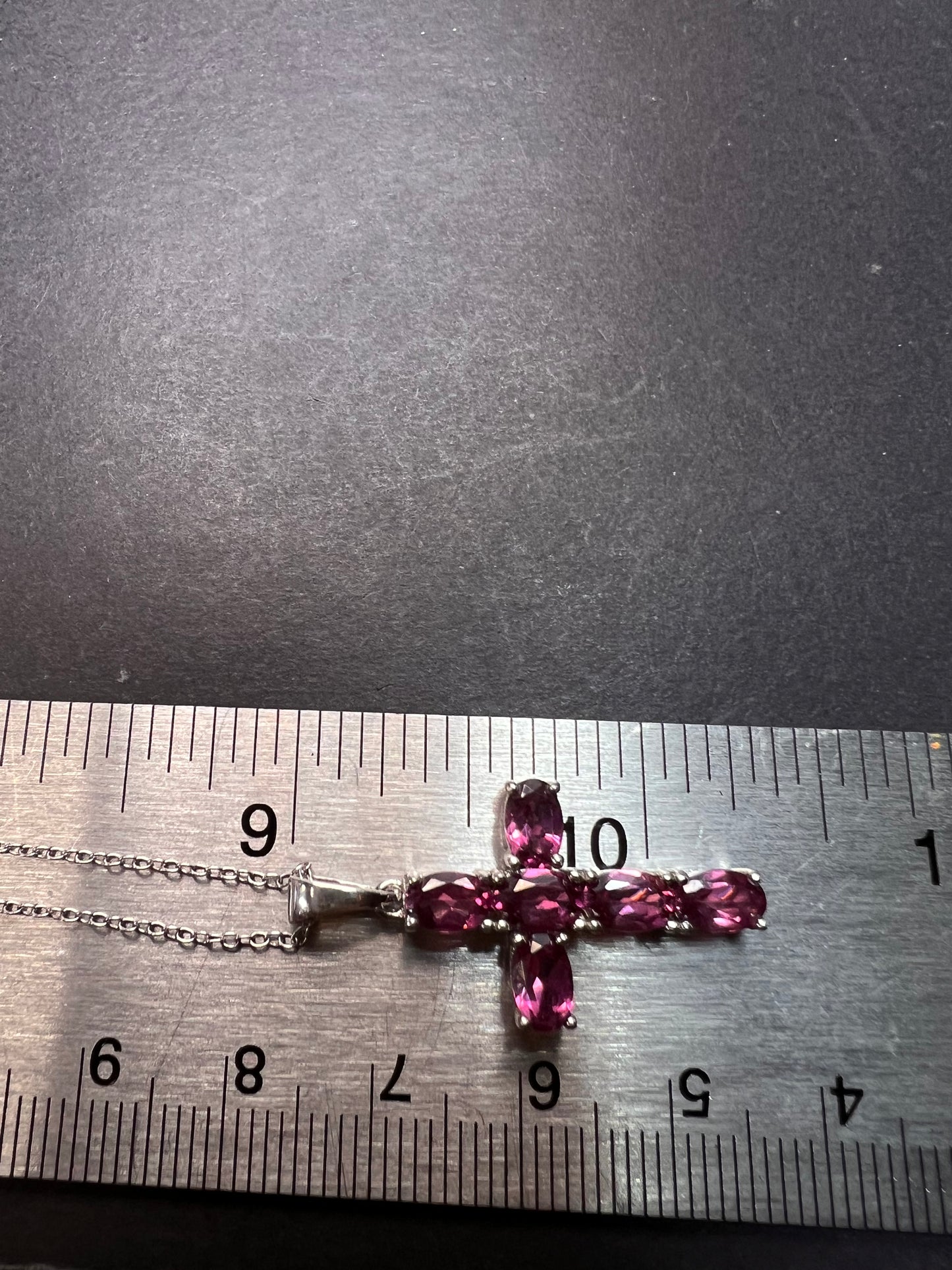 Raspberry rhodolite garnet cross pendant and chain necklace in sterling silver