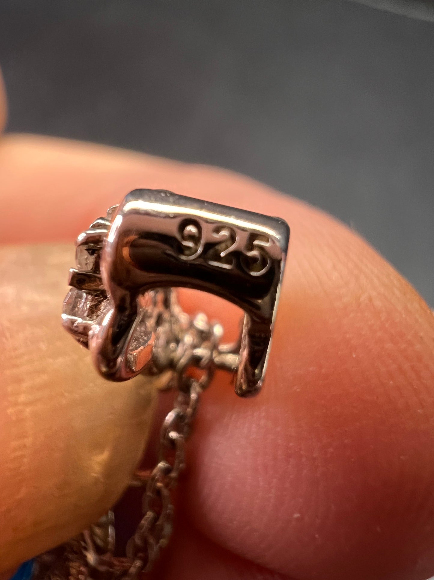 Blue and white CZ sterling silver halo pendant