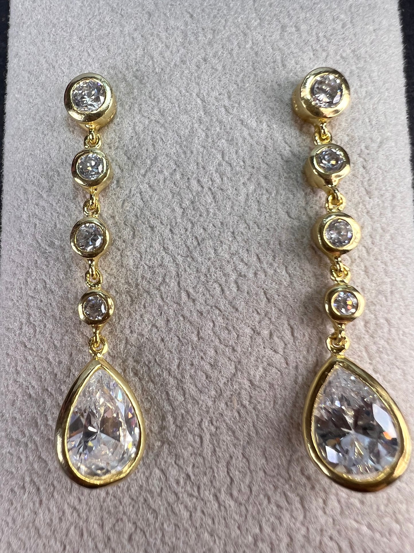 Long teardrop CZ earrings in gold over sterling silver