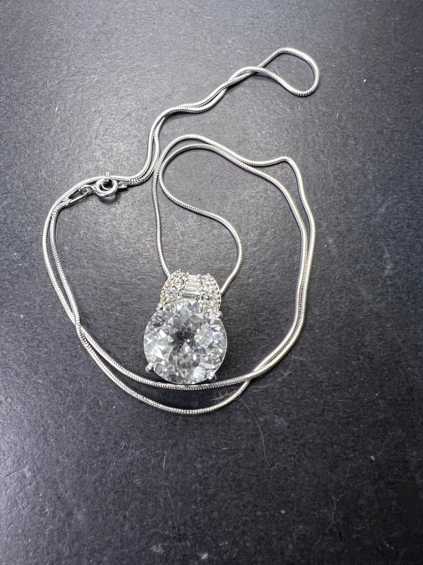 White topaz sterling silver pendant and 20 inch chain necklace