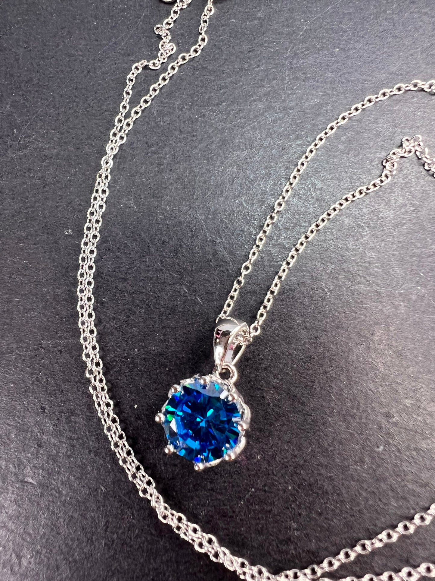 YGI blue CZ rhodium over sterling silver solitaire pendant and chain